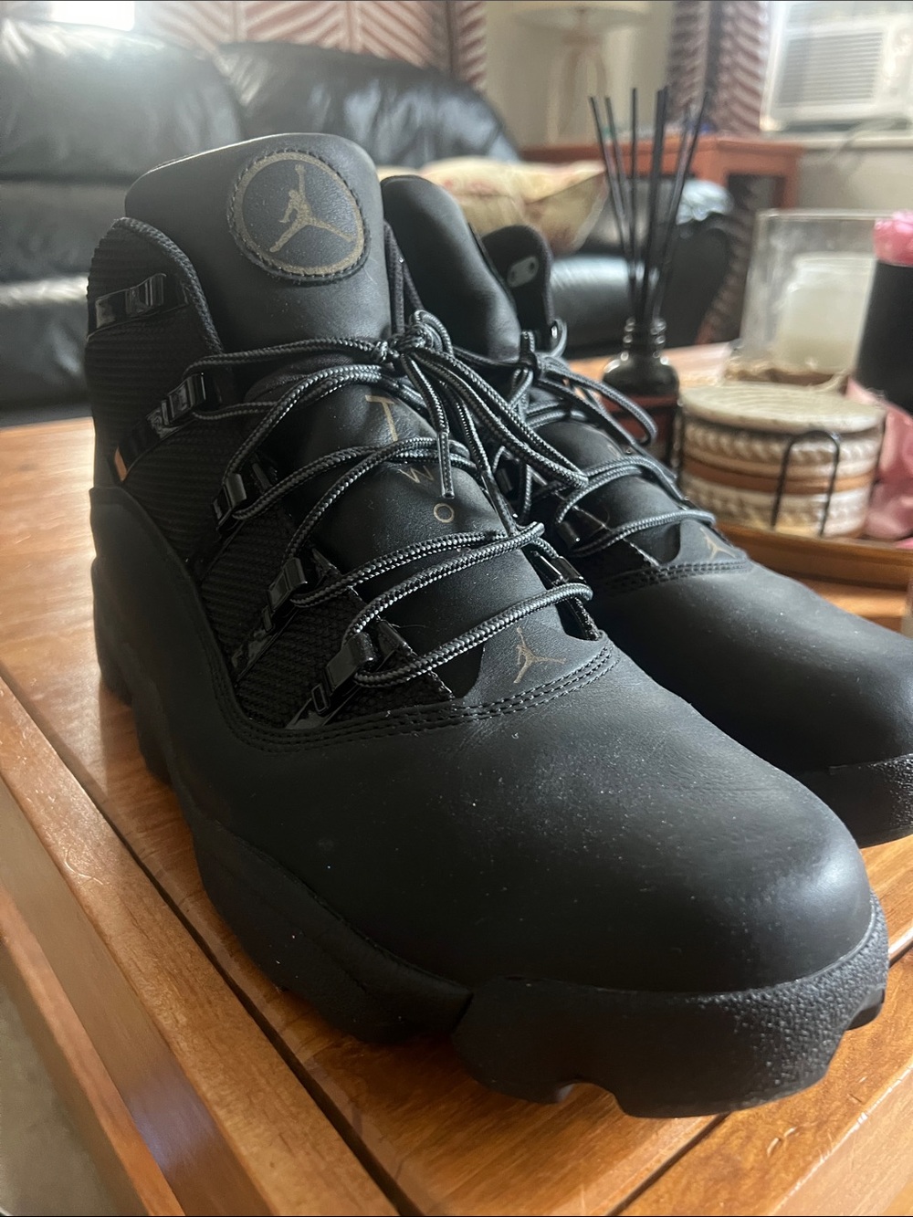 Jordan Men's Black High-Top Sneakers with Subtle Gold Jumpman